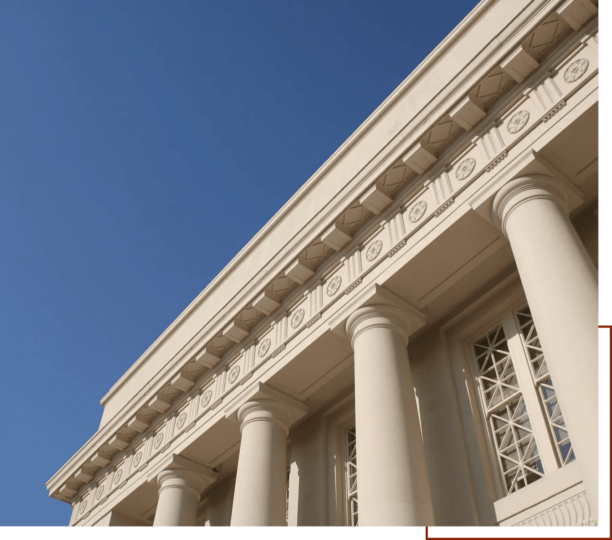 Elegant neoclassical architecture under blue sky