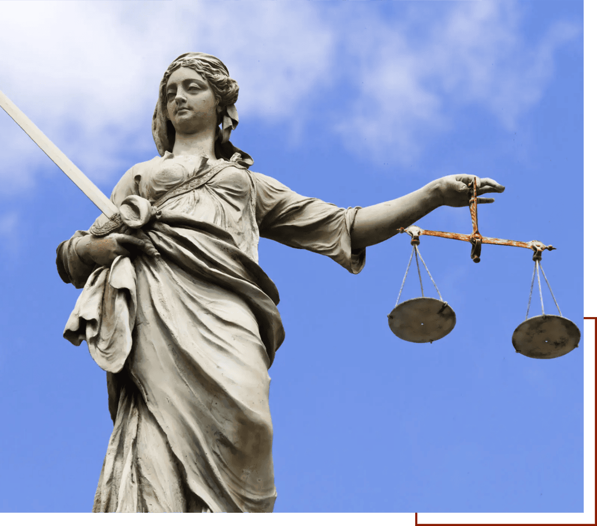 Justice statue holding sword and scales