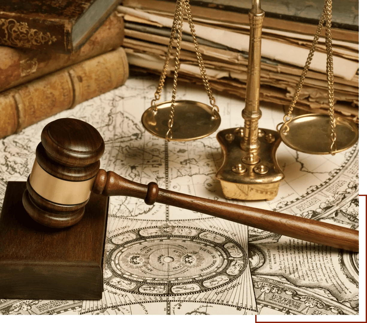 Gavel and scales on vintage map